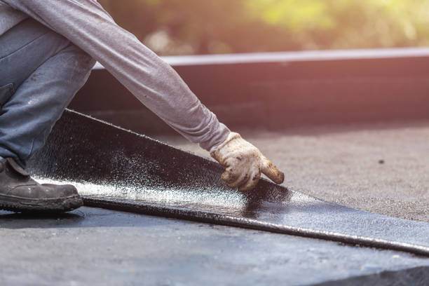 Professional Waterproofing technician working in Holton, IN